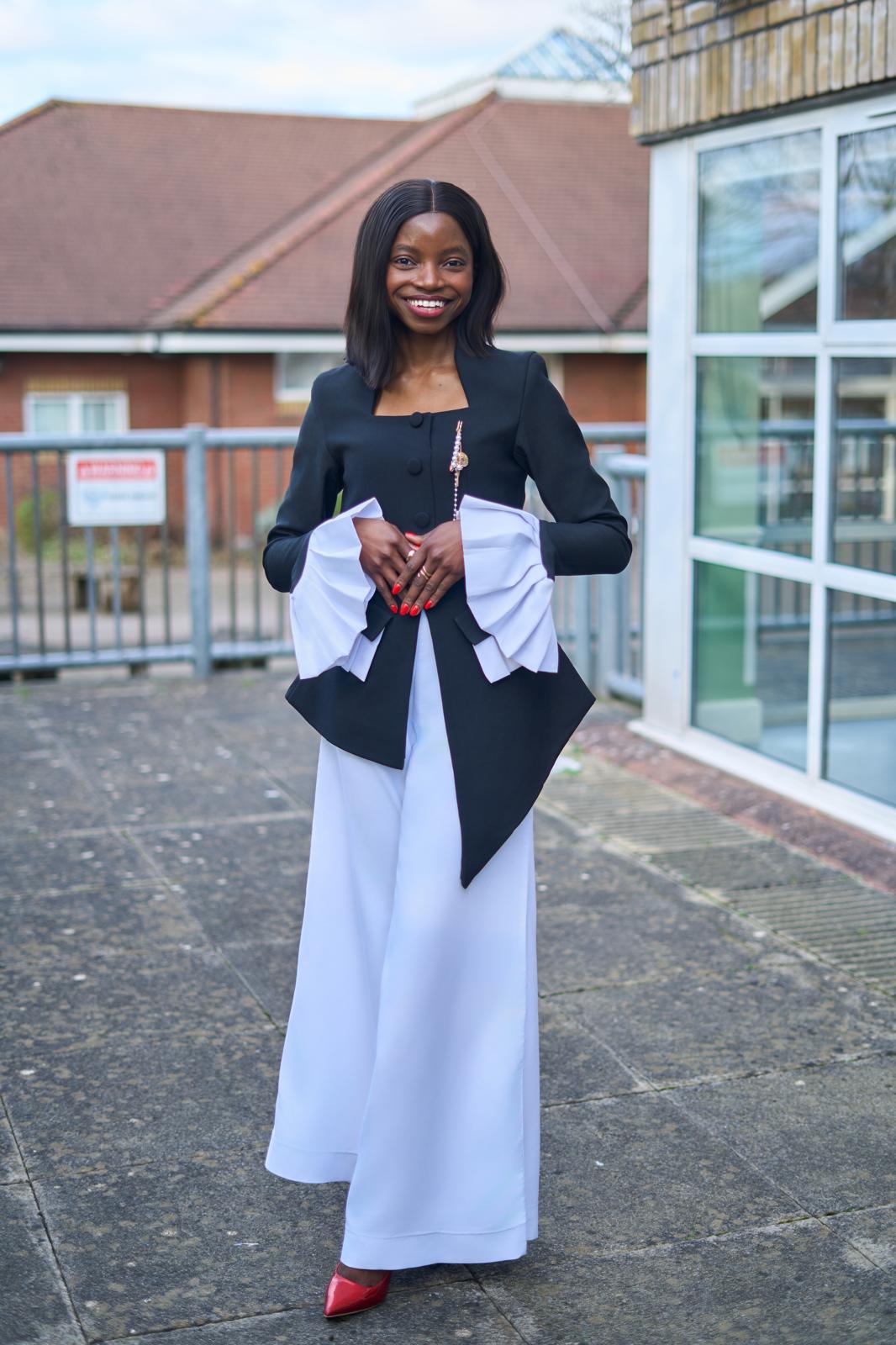 Anave Alonge in black and white tailored outfit